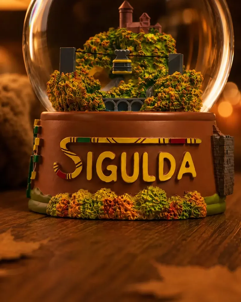 Close-up of the Sigulda Autumn Globe base with golden-autumn details