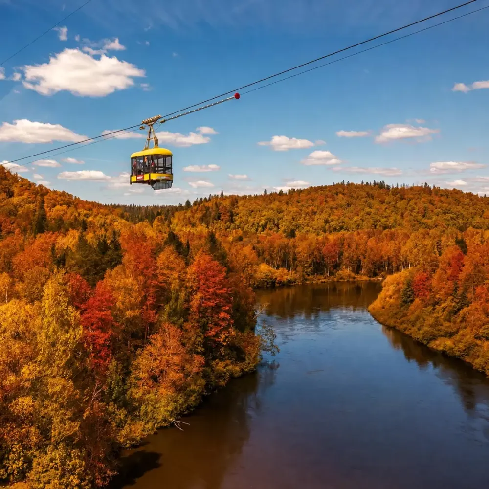 The Sigulda cable car over the Gauja valley in golden autumn colours